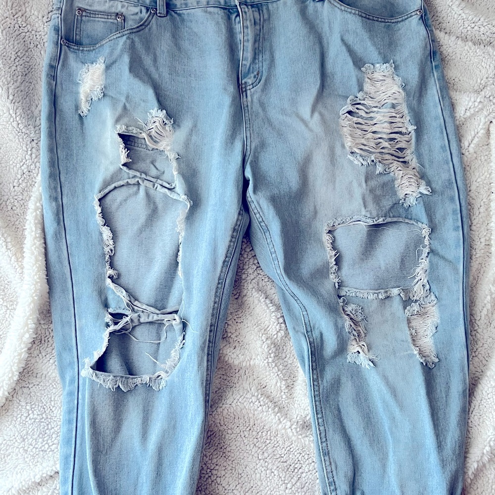 Distressed denim jeans